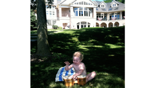 Illustration for article titled Minnie Driver's Naked Baby Plays The Bongos
